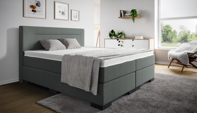 Mikrofeder Boxspringbett Paul  mit Kopfteil Moritz ohne Seitenabstand. Eckige Füße in Schwarz.