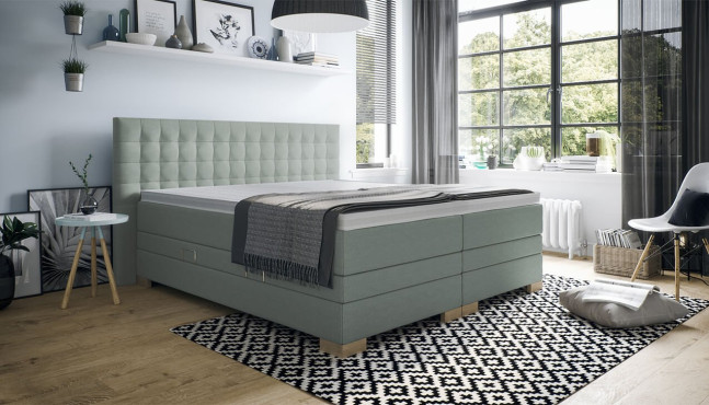 Boxspringbett Kate mit Kopfteil Moritz mit Seitenabstand. Eckige Füße in Buche.
