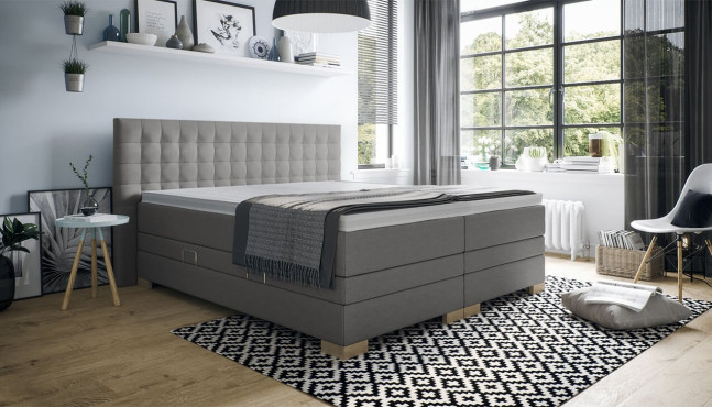 Boxspringbett Kate mit Kopfteil Moritz mit Seitenabstand. Eckige Füße in Buche.