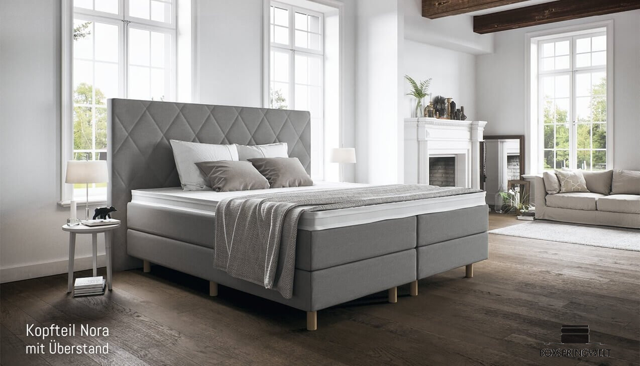 Mit Kopfteil Nora mit Seitenabstand. Runde Füße, Buche.